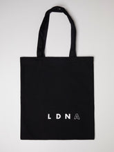 Load image into Gallery viewer, LDNA London black tote bag with LDNA logo against white background.